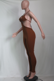 Pink Sexy Solid Hollowed Out Halter Skinny Jumpsuits