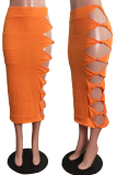 Orange Sexy Solid Hollowed Out Skinny Mid Waist Pencil Solid Color Bottoms