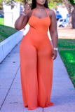 Tangerine Red Sexy Solid Patchwork Mesh Halter Straight Jumpsuits