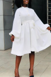 Yellow Fashion Casual Solid Bandage O Neck Long Sleeve Dresses