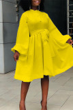 Yellow Fashion Casual Solid Bandage O Neck Long Sleeve Dresses