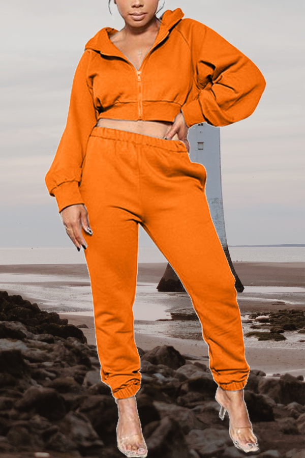 Orange Sexy Solid Split Joint Hooded Collar Long Sleeve Two Pieces