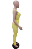 Yellow Fashion Sexy Patchwork Hollowed Out Backless One Shoulder Skinny Jumpsuits