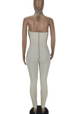 Beige Sexy Solid Patchwork Backless Halter Skinny Jumpsuits