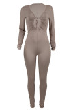 Khaki Sexy Casual Solid Bandage Hollowed Out V Neck Skinny Jumpsuits