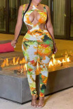 Yellow Fashion Sexy Print Hollowed Out Skinny Jumpsuits