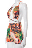 Tangerine Sexy Print Hollowed Out Patchwork Frenulum Backless Halter Skinny Rompers