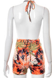 Tangerine Sexy Print Hollowed Out Patchwork Frenulum Backless Halter Skinny Rompers