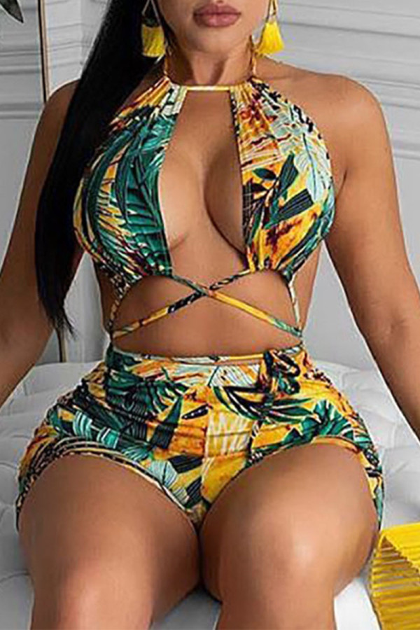 Yellow Sexy Print Hollowed Out Patchwork Frenulum Backless Halter Skinny Rompers