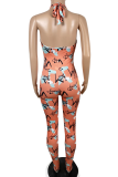 Orange Sexy Print Hollowed Out Halter Skinny Jumpsuits