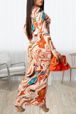 Orange Sexy Print Hollowed Out Patchwork Frenulum V Neck One Step Skirt Dresses