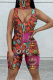 Orange Sexy Print Patchwork V Neck Skinny Rompers