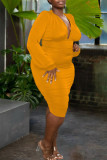 Yellow Sexy Solid Patchwork Fold V Neck One Step Skirt Plus Size Dresses