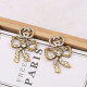 Gold Fashion Simplicity Letter With Bow Earrings