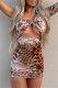 Brown Fashion Sexy Print Leopard Hollowed Out Oblique Collar Long Sleeve Dresses