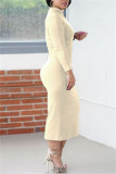Yellow Fashion Casual Solid Bandage Hollowed Out O Neck Long Sleeve Dresses