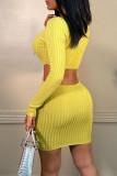 Yellow Sexy Solid Bandage Hollowed Out Split Joint V Neck One Step Skirt Dresses