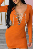 Orange Sexy Solid Hollowed Out Draw String V Neck Pencil Skirt Dresses