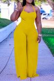 Yellow Sexy Solid Mesh Halter Loose Jumpsuits