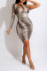 Apricot Sexy Print Hollowed Out Patchwork Asymmetrical Oblique Collar One Step Skirt Dresses