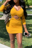 Yellow Fashion Sexy Solid Hollowed Out V Neck Long Sleeve Dresses