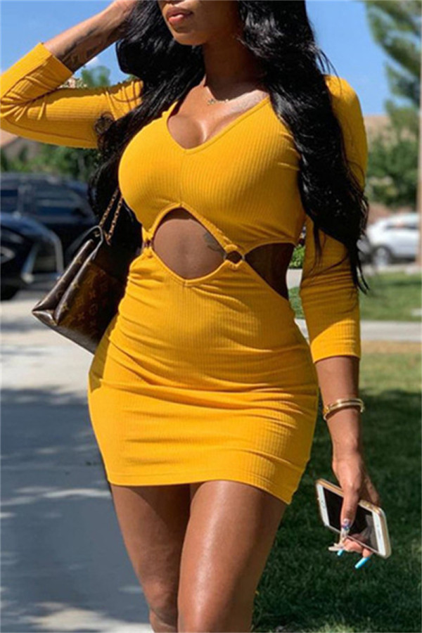 Yellow Fashion Sexy Solid Hollowed Out V Neck Long Sleeve Dresses