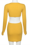 Yellow Fashion Sexy Solid Hollowed Out V Neck Long Sleeve Dresses