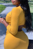 Yellow Fashion Sexy Solid Hollowed Out V Neck Long Sleeve Dresses