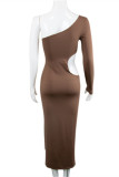 Brown Fashion Sexy Solid Hollowed Out Backless Oblique Collar Long Sleeve Dresses