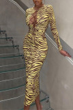 Yellow Fashion Sexy Print Hollowed Out Frenulum O Neck Long Sleeve Dresses