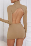 Khaki Fashion Sexy Solid Hollowed Out Backless Turtleneck Long Sleeve Dresses