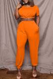Tangerine Casual Solid Split Joint Asymmetrical O Neck Short Sleeve Two Pieces