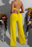 Yellow Sexy Solid Patchwork Frenulum Backless O Neck Loose Jumpsuits