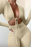 Apricot Sexy Casual Solid Bandage Hollowed Out V Neck Skinny Jumpsuits