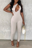 Apricot Sexy Casual Solid Hollowed Out Backless One Shoulder Skinny Jumpsuits