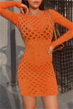 Orange Fashion Sexy Solid Hollowed Out See-through O Neck Long Sleeve Dresses