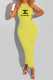 Yellow Fashion Sexy Print Letter O Neck One Step Skirt Dresses