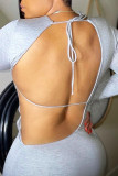 Grey Fashion Sexy Solid Bandage Backless O Neck Long Sleeve Dresses