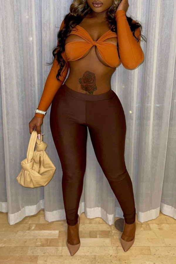 Tangerine Sexy Solid Hollowed Out Patchwork Asymmetrical V Neck Long Sleeve Two Pieces