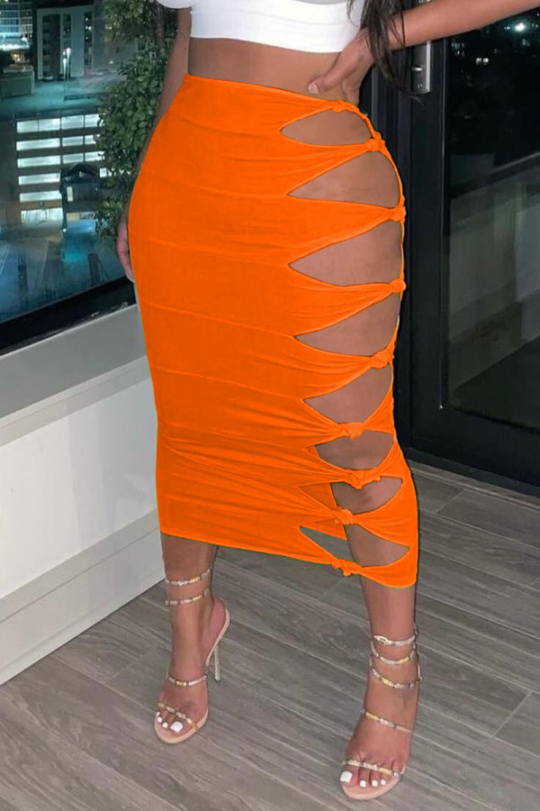 Orange Sexy Solid Hollowed Out Patchwork High Waist Pencil Solid Color Bottoms