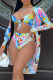Orange Sexy Print Hollowed Out Patchwork Swimwears