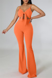 Orange Fashion Sexy Solid Hollowed Out Backless Spaghetti Strap Skinny Jumpsuits