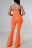 Orange Fashion Sexy Solid Hollowed Out Backless Spaghetti Strap Skinny Jumpsuits
