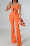 Orange Fashion Sexy Solid Hollowed Out Backless Spaghetti Strap Skinny Jumpsuits