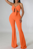 Orange Fashion Sexy Solid Hollowed Out Backless Spaghetti Strap Skinny Jumpsuits