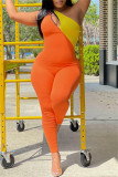 Orange Sexy Casual Solid Patchwork Backless One Shoulder Skinny Jumpsuits