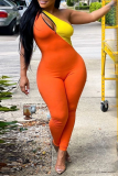 Tangerine Red Sexy Patchwork Hollowed Out One Shoulder Skinny Jumpsuits
