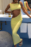 Yellow Sexy Solid Hollowed Out Patchwork O Neck One Step Skirt Dresses