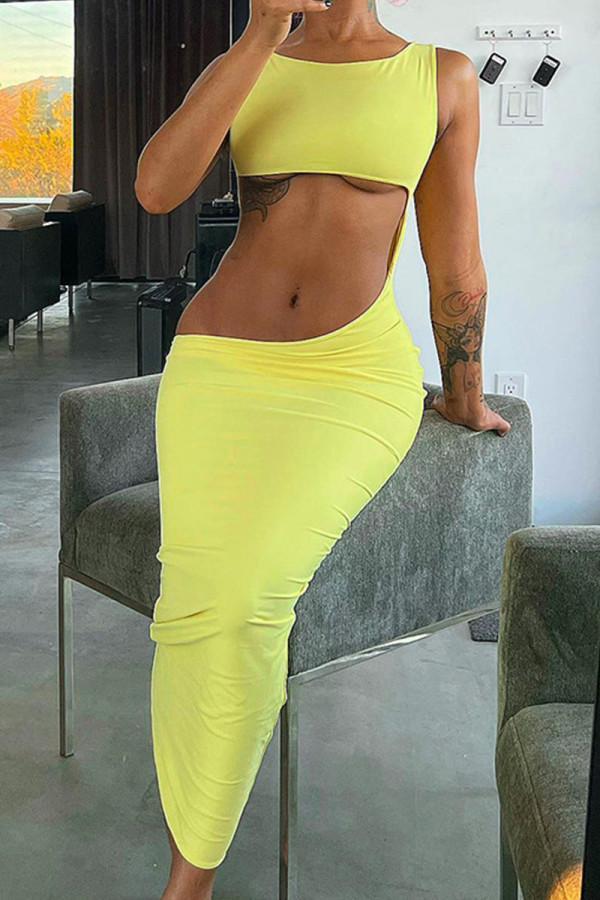 Yellow Sexy Solid Hollowed Out Patchwork O Neck One Step Skirt Dresses