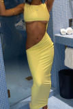 Yellow Sexy Solid Hollowed Out Patchwork O Neck One Step Skirt Dresses